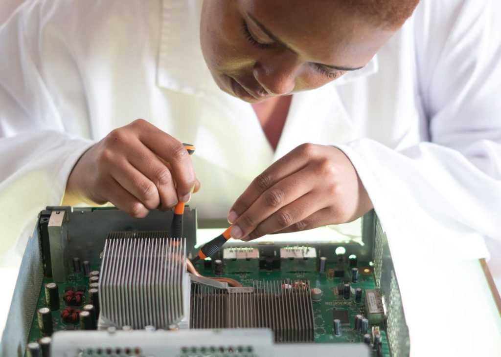 technical seo checklist; woman fixing inside of a computer
